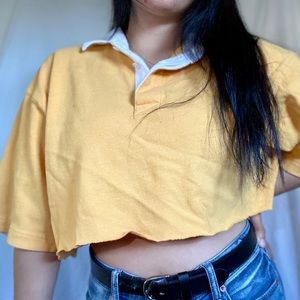 Yellow cropped polo shirt